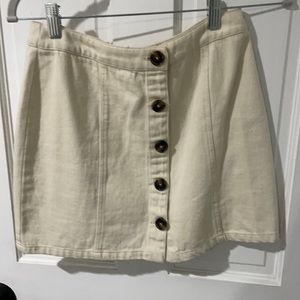 white denim skirt with buttons